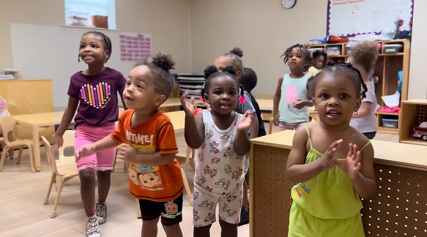 Children playing together in classroom